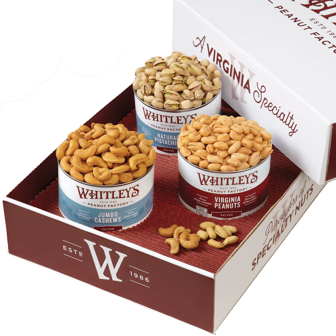 16 oz. Tin Salted Natural Pistachios, 20 oz. Tin Salted Virginia Peanuts, 18 oz. Tin Salted Jumbo Cashews with branded gift box